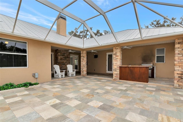 920 Lena Ln, Sarasota, FL 34240 - view of patio with ceiling fan, an outdoor kitchen, a lanai, and exterior bar