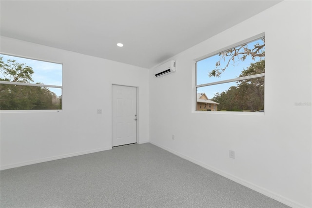 920 Lena Ln, Sarasota, FL 34240 - spare room with a wall mounted air conditioner, plenty of natural light, and recessed lighting