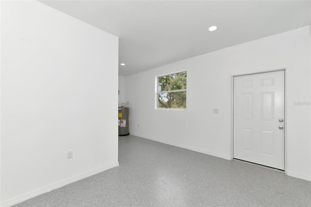920 Lena Ln, Sarasota, FL 34240 - unfurnished room featuring water heater and recessed lighting