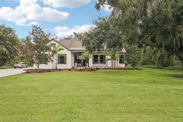3906 Twin Rivers Trl, Parrish, FL 34219 - view of front facade with a front yard and concrete driveway