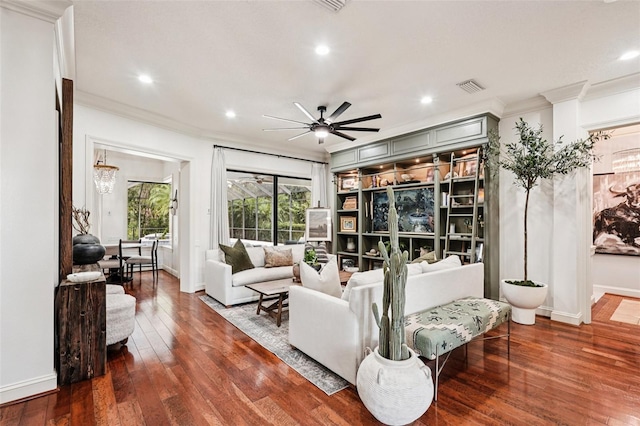 3906 Twin Rivers Trl, Parrish, FL 34219 - living room with crown molding, ceiling fan, wood-type flooring, and recessed lighting