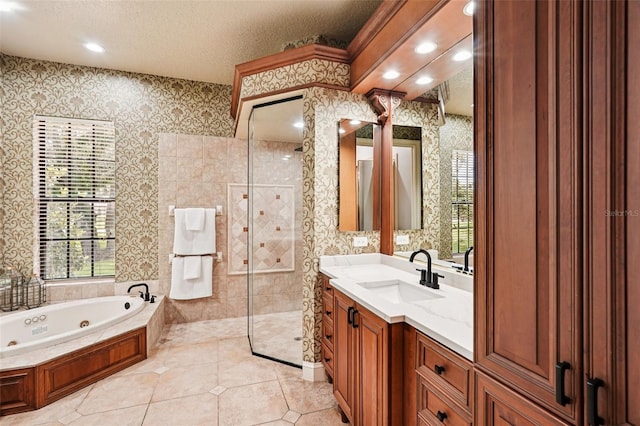 3906 Twin Rivers Trl, Parrish, FL 34219 - bathroom with tiled shower, a whirlpool tub, vanity, healthy amount of natural light, and wallpapered walls