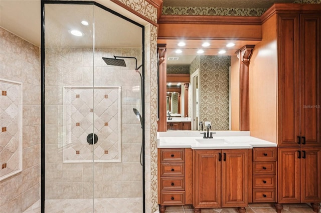 3906 Twin Rivers Trl, Parrish, FL 34219 - bathroom featuring a stall shower, vanity, and wallpapered walls
