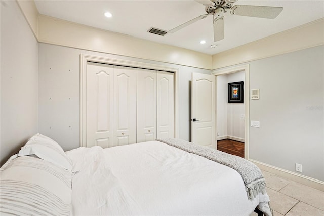 3906 Twin Rivers Trl, Parrish, FL 34219 - bedroom featuring a closet, recessed lighting, a ceiling fan, and tile patterned floors