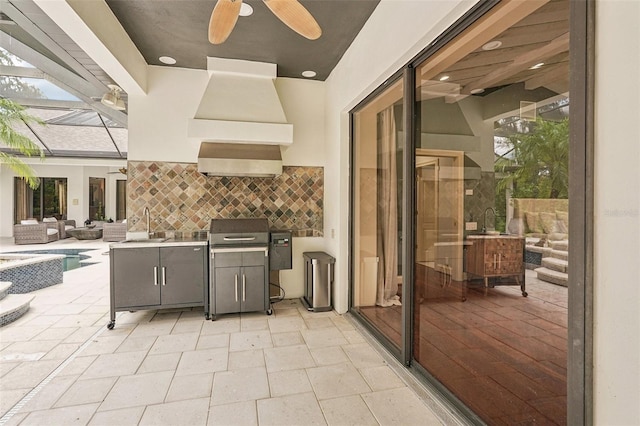 3906 Twin Rivers Trl, Parrish, FL 34219 - view of patio / terrace with ceiling fan, an outdoor hangout area, and area for grilling