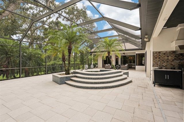 3906 Twin Rivers Trl, Parrish, FL 34219 - view of patio with a ceiling fan, glass enclosure, and a hot tub