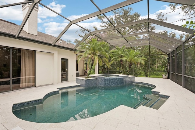 3906 Twin Rivers Trl, Parrish, FL 34219 - view of pool with a patio area, a pool with connected hot tub, and a lanai