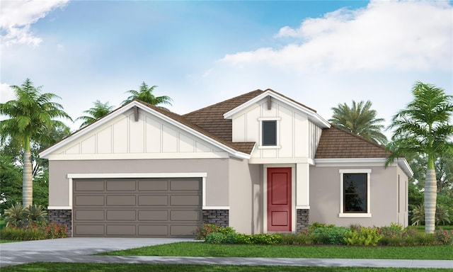 6555 Big Bayou Dr, Sarasota, FL 34241 - view of front facade featuring stone siding, board and batten siding, and a garage