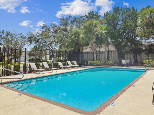 1415 Millbrook Cir, Bradenton, FL 34212 - community pool featuring a patio area