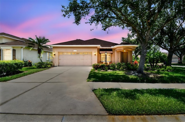 1415 Millbrook Cir, Bradenton, FL 34212 - single story home featuring a garage, stucco siding, and concrete driveway
