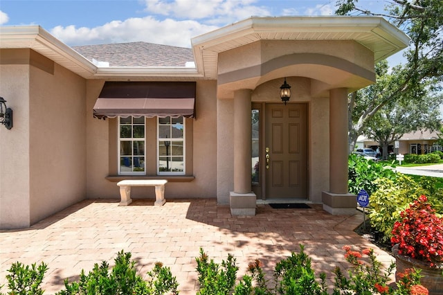 1415 Millbrook Cir, Bradenton, FL 34212 - view of exterior entry featuring stucco siding