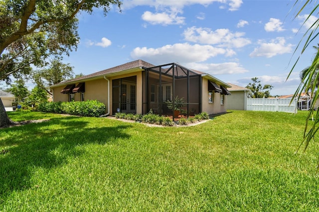 1415 Millbrook Cir, Bradenton, FL 34212 - rear view of house with french doors and stucco siding