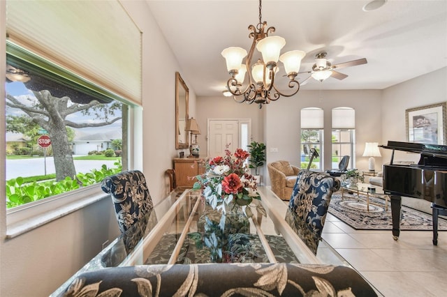 1415 Millbrook Cir, Bradenton, FL 34212 - tiled dining area with a chandelier and a ceiling fan