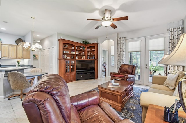 1415 Millbrook Cir, Bradenton, FL 34212 - living area with a chandelier, ceiling fan, light tile patterned floors, arched walkways, and recessed lighting