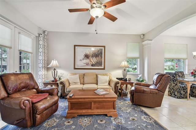 1415 Millbrook Cir, Bradenton, FL 34212 - living room with arched walkways, a ceiling fan, and tile patterned floors