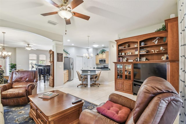 1415 Millbrook Cir, Bradenton, FL 34212 - living area with a ceiling fan, a chandelier, ornate columns, light tile patterned floors, and recessed lighting