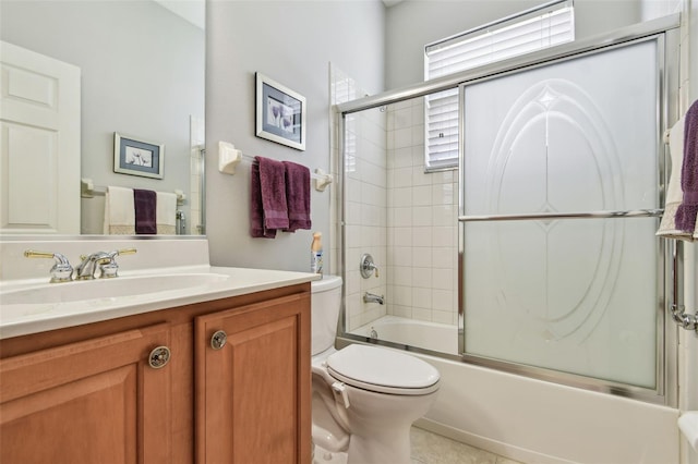 1415 Millbrook Cir, Bradenton, FL 34212 - bathroom with vanity and bath / shower combo with glass door
