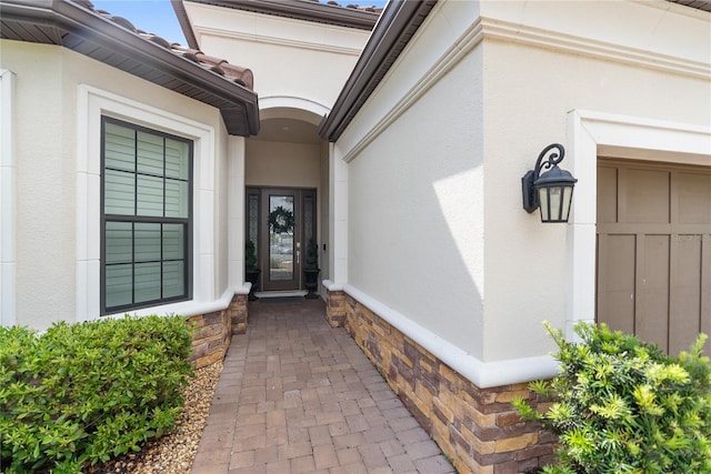 4735 Cassio Ct, Bradenton, FL 34211 - property entrance featuring stucco siding and stone siding