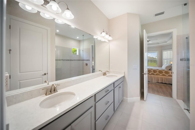 4735 Cassio Ct, Bradenton, FL 34211 - ensuite bathroom with double vanity, healthy amount of natural light, and a stall shower