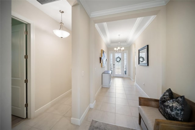 4735 Cassio Ct, Bradenton, FL 34211 - hallway featuring a chandelier, light tile patterned floors, and crown molding