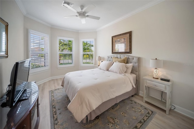 4735 Cassio Ct, Bradenton, FL 34211 - bedroom with light wood-type flooring, crown molding, and ceiling fan