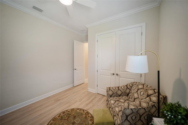 4735 Cassio Ct, Bradenton, FL 34211 - sitting room with light wood-type flooring, crown molding, and ceiling fan