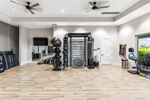 4735 Cassio Ct, Bradenton, FL 34211 - gym featuring a ceiling fan, light wood-style floors, recessed lighting, and a towering ceiling