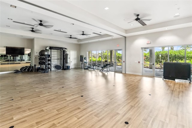 4735 Cassio Ct, Bradenton, FL 34211 - gym featuring a raised ceiling, a ceiling fan, light wood-style flooring, and recessed lighting