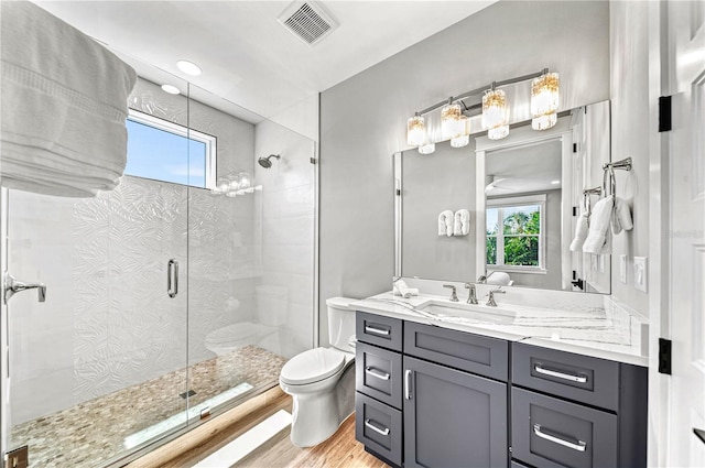 119 Avenida Messina, Sarasota, FL 34242 - full bath featuring a stall shower, wood finished floors, and vanity