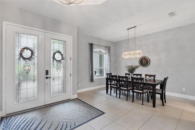 16038 39th Gln E, Parrish, FL 34219 - dining space featuring a chandelier and light tile patterned floors