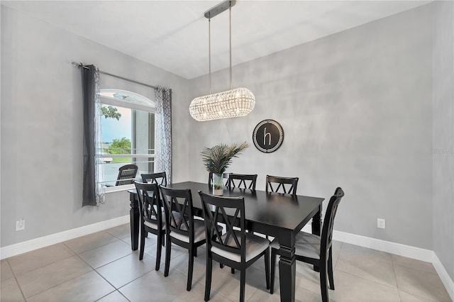 16038 39th Gln E, Parrish, FL 34219 - tiled dining room with baseboards and a chandelier