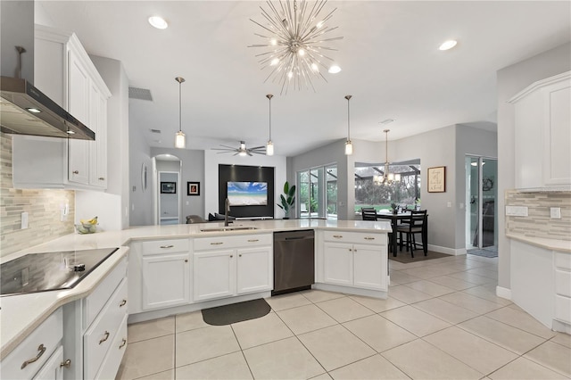 16038 39th Gln E, Parrish, FL 34219 - kitchen featuring stainless steel dishwasher, wall chimney exhaust hood, a chandelier, black electric cooktop, and decorative backsplash