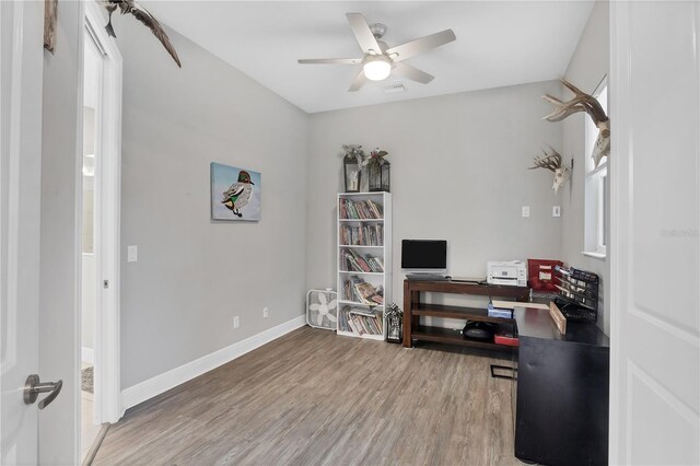 16038 39th Gln E, Parrish, FL 34219 - office area featuring light wood finished floors and a ceiling fan