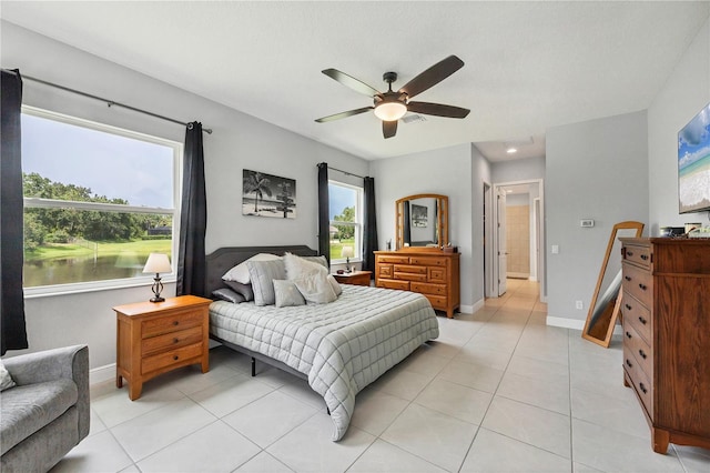 16038 39th Gln E, Parrish, FL 34219 - bedroom featuring light tile patterned flooring and ceiling fan
