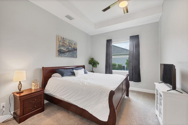 16038 39th Gln E, Parrish, FL 34219 - carpeted bedroom featuring ceiling fan and a tray ceiling