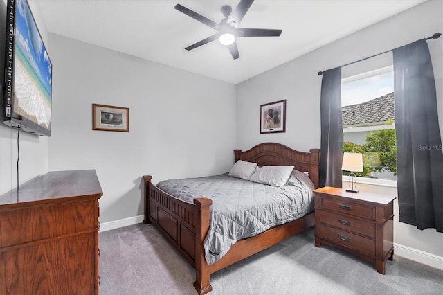 16038 39th Gln E, Parrish, FL 34219 - carpeted bedroom with baseboards and a ceiling fan