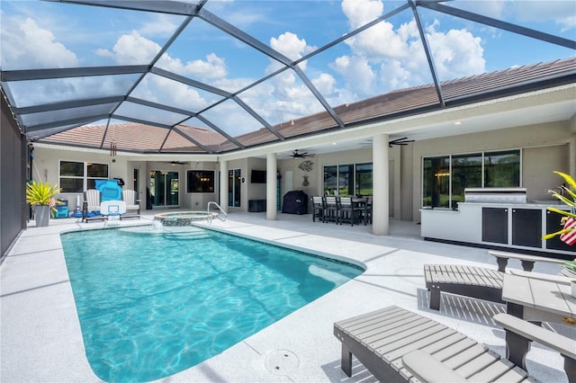 16038 39th Gln E, Parrish, FL 34219 - view of swimming pool featuring a ceiling fan, a patio area, a pool with connected hot tub, glass enclosure, and area for grilling