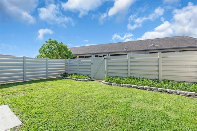 327 40th Ct W, Palmetto, FL 34221 - fenced backyard with a gate