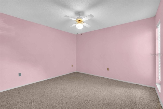327 40th Ct W, Palmetto, FL 34221 - unfurnished room with carpet, ceiling fan, and a textured ceiling