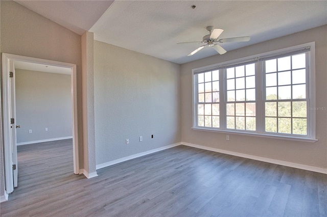 4140 Central Sarasota Pkwy Unit 1235, Sarasota, FL 34238 - unfurnished room featuring wood finished floors and ceiling fan