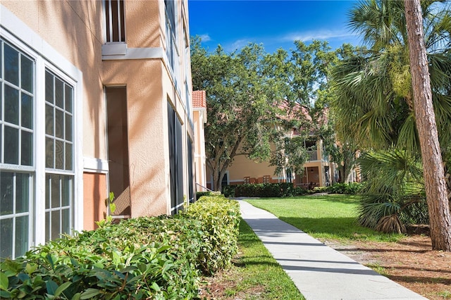 4140 Central Sarasota Pkwy Unit 1235, Sarasota, FL 34238 - view of home's community featuring a yard