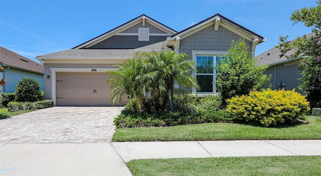 11223 Spring Gate Trl, Bradenton, FL 34211 - view of front of home with a garage, driveway, and a front yard