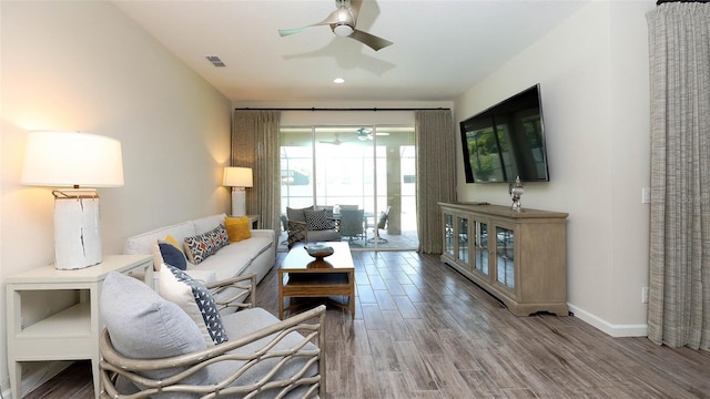 11223 Spring Gate Trl, Bradenton, FL 34211 - living area featuring a ceiling fan and wood finished floors