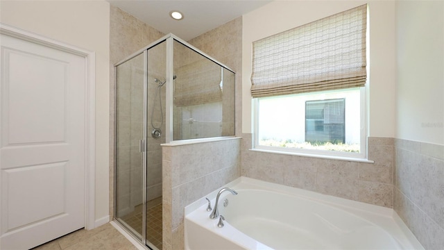11223 Spring Gate Trl, Bradenton, FL 34211 - full bath with a garden tub, a stall shower, and tile patterned flooring