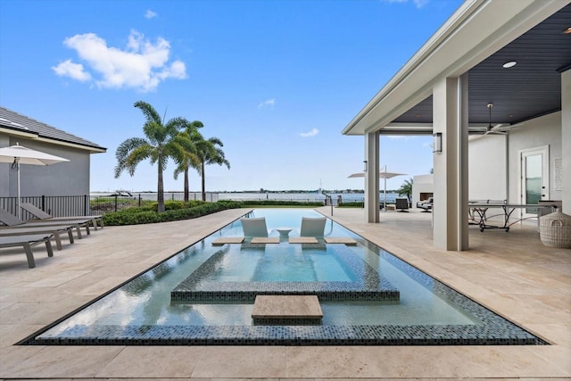 676 Regatta Way, Bradenton, FL 34208 - view of pool featuring a patio area, ceiling fan, and a pool with connected hot tub