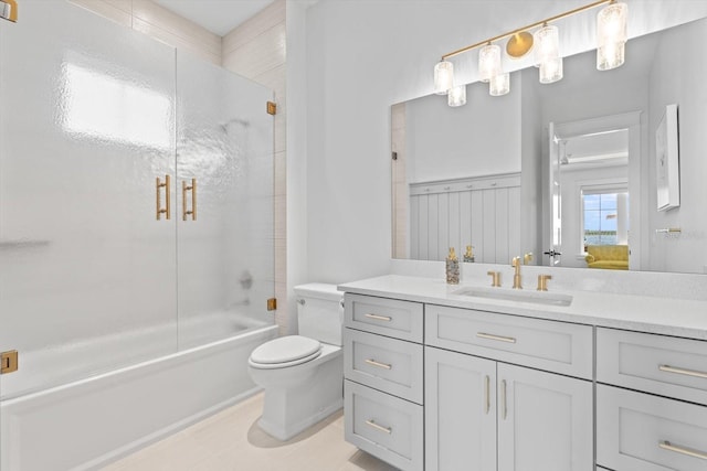 676 Regatta Way, Bradenton, FL 34208 - bathroom featuring connected bathroom, vanity, shower / bath combination with glass door, and tile patterned floors