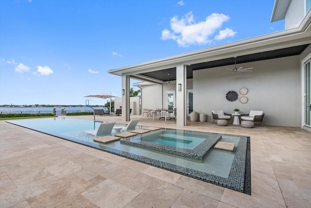 676 Regatta Way, Bradenton, FL 34208 - view of swimming pool with a patio area, a ceiling fan, outdoor dining space, and a pool with connected hot tub