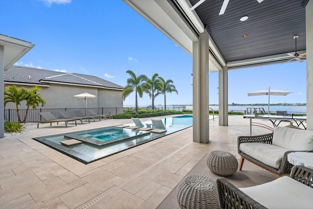 676 Regatta Way, Bradenton, FL 34208 - view of swimming pool featuring a patio area, ceiling fan, and a pool with connected hot tub