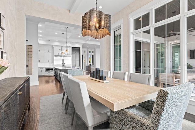 676 Regatta Way, Bradenton, FL 34208 - dining space featuring a chandelier, dark wood-type flooring, and recessed lighting