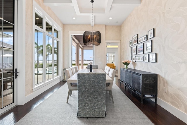 676 Regatta Way, Bradenton, FL 34208 - dining room with dark wood-style flooring, plenty of natural light, a chandelier, and recessed lighting